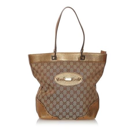 punches woman gucci bag|Gucci GG Canvas Punch Tote .